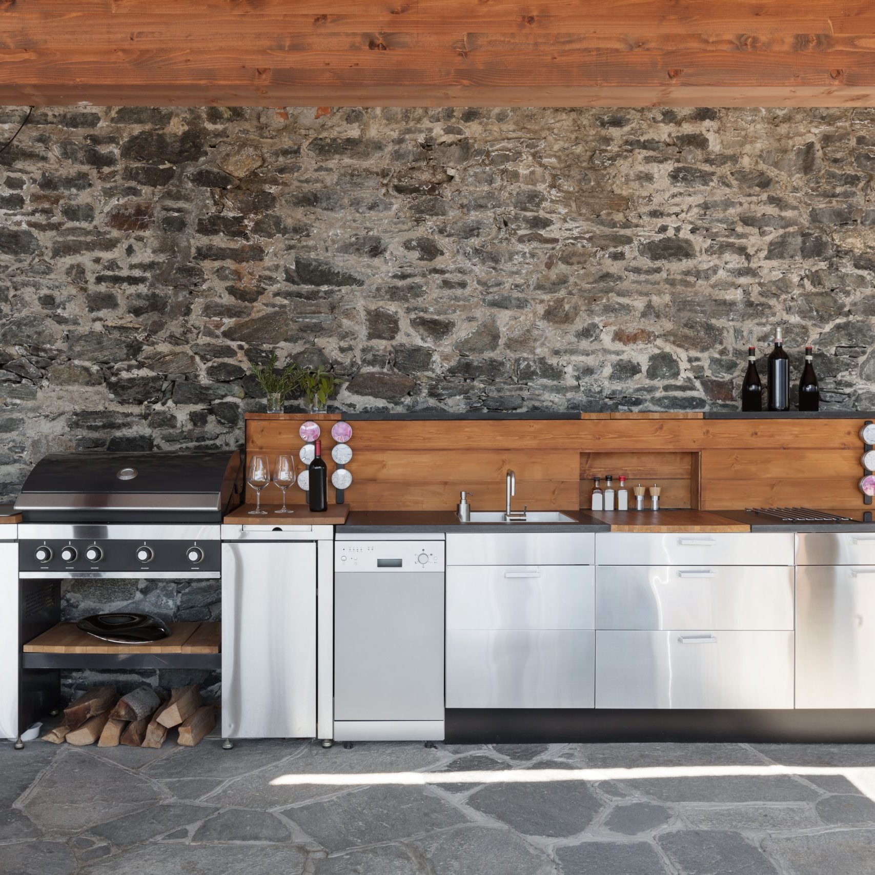 House, modern kitchen with barbecue on the veranda